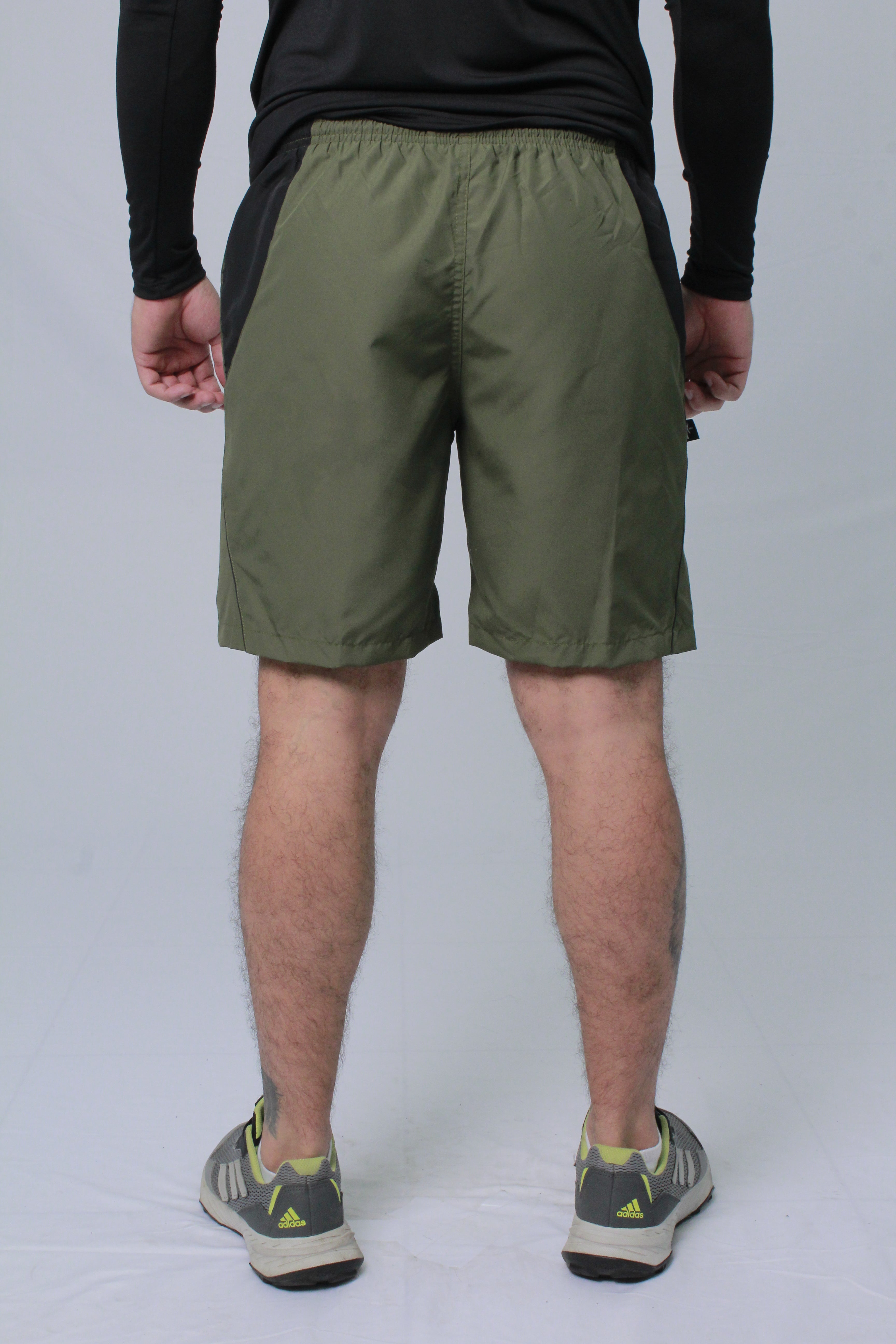 Pantaloneta Deportiva NKI hombre con bolsillo lateral